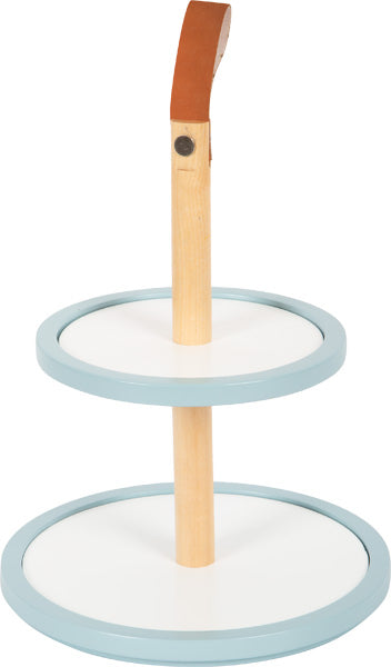 Zweistufiger Etagere-Servierständer mit blau umrandeten Tabletts, einem hölzernen Mittelpfosten und einem braunen Ledergriff oben – perfekt zum Präsentieren von Cupcakes in Ihrer Kinderküche.