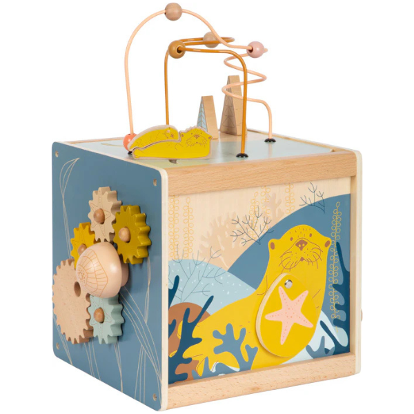 Motorikwürfel aus Holz mit Zahnrädern, Motorikschleife und Seeotter-Illustration, verziert mit Motiven zum Thema Meer – das perfekte Holzspielzeug zur Förderung der Feinmotorik.