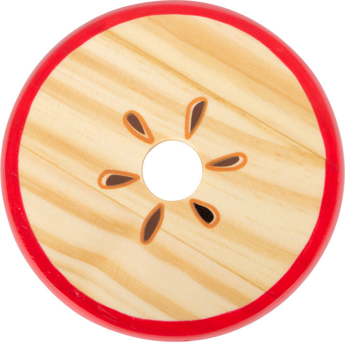Eine runde Scheibe in Form eines geschnittenen Apfels, gefertigt aus Vollholz, mit rotem Rand und Samenmuster in der Mitte.