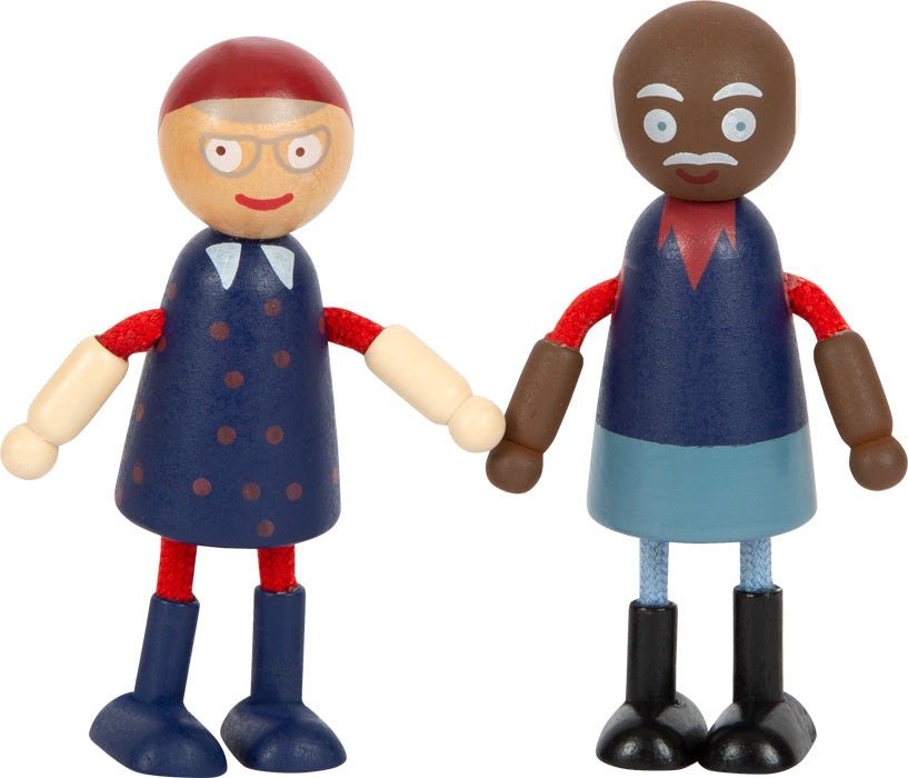 Zwei Biegepüppchen-Holzspielzeugfiguren mit bemalten Gesichtern, blauen Outfits und beweglichen Armen stehen Seite an Seite und spiegeln die Diversität in jeder Puppenfamiliensammlung wider.