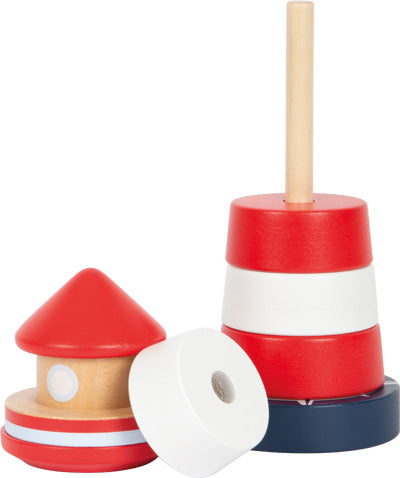 Stapelturm aus Holz mit roten, weißen und blauen Ringen an einer senkrechten Stange – perfekt als Motorikspielzeug zur Förderung der Feinmotorik.