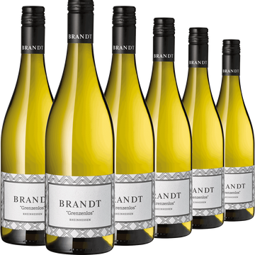 Sechs Flaschen Weißwein Cuvée „Grenzenlos“ stehen mit sichtbaren Etiketten in einer Reihe – perfekt für den Adventskalender oder festliche Anlässe.