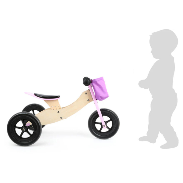 Laufrad aus Holz mit schwarzen Rädern und einer lila Tasche, abgebildet neben einer  Kindersilhouette.