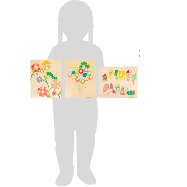 Es sind sind drei Holzpuzzlebretter  vor einer Kindersilhouette abgebildet.