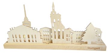 Holzsilhouette der Stuttgarter Wahrzeichen auf einem Ständer aus Echtholz mit der Gravur „Stuttgart“ auf der Vorderseite. Inspiriert von der Kunst des Erzgebirges dient dieses Stück auch als charmanter Teelichthalter für gemütliches Ambiente.