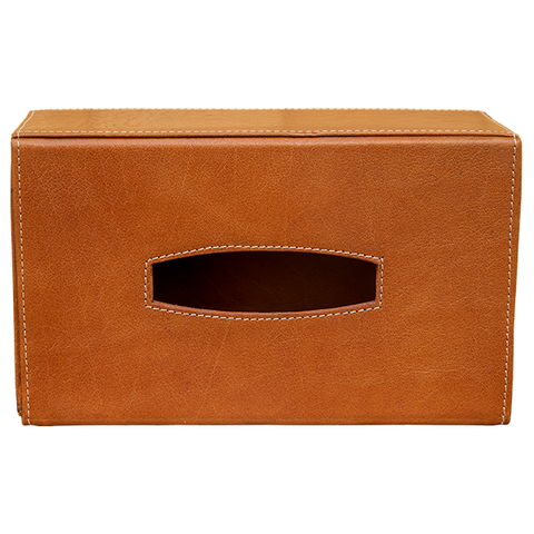 Die KISTERL Kosmetiktücherbox besteht aus edlem Büffelleder und verfügt über eine ovale Öffnung in der Mitte, stilvoll präsentiert auf weißem Hintergrund.