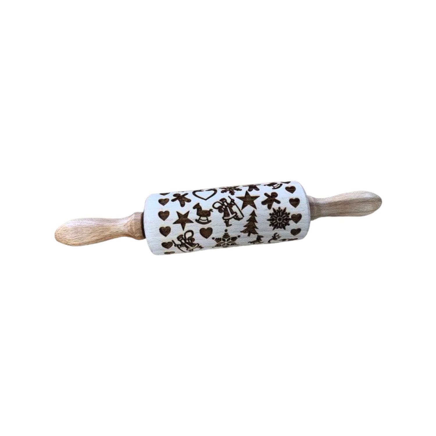 Der Keksroller „Weihnachten“ mit weihnachtlichen Mustern wie Sternen, Herzen, einem Lebkuchenmann, einem Baum und einer Schneeflocke auf Weiß kommt mit Rezept und Anleitung – ideal für festliche Backen in der Weihnachtszeit.