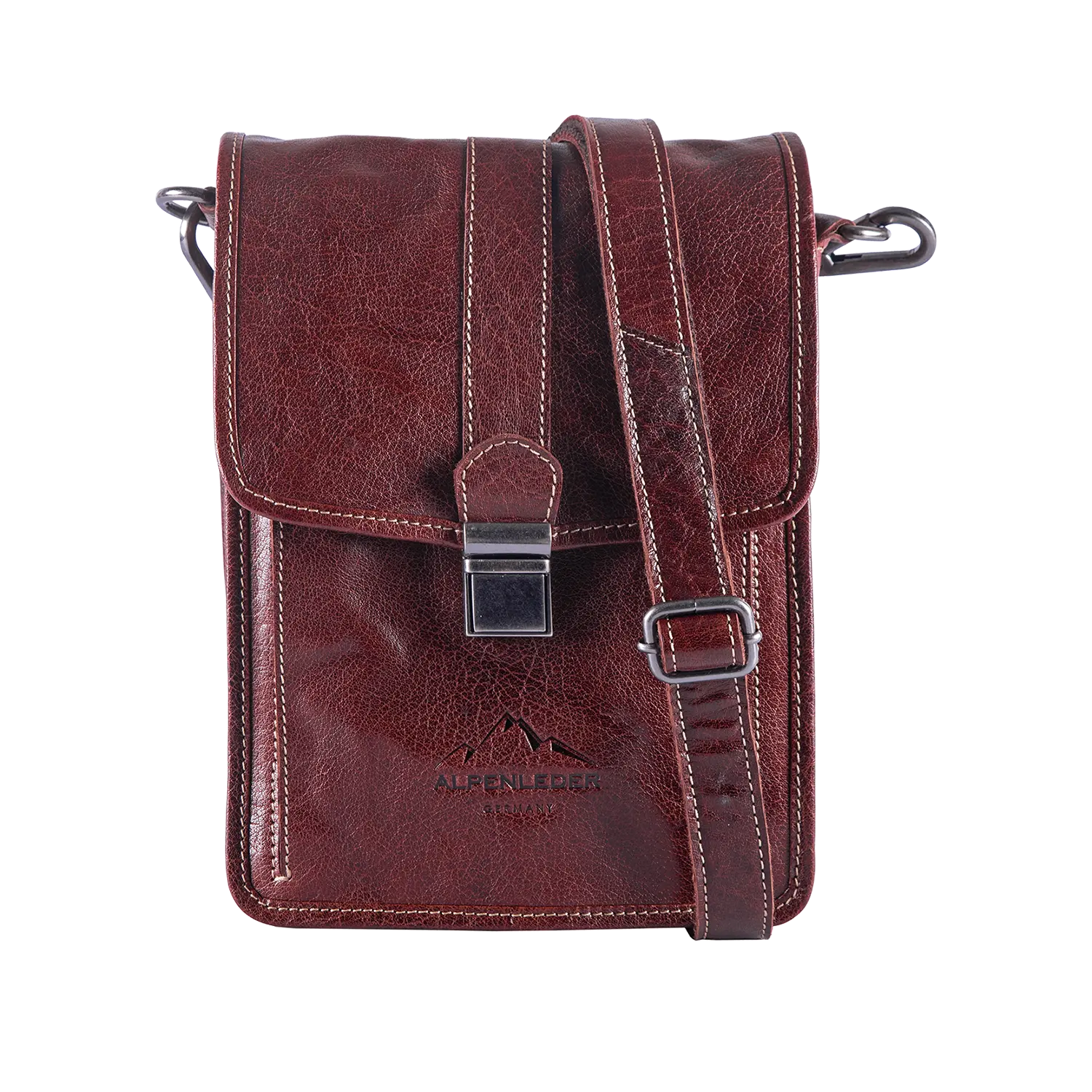 Die Schultertasche GALILEO vereint Stil und Funktionalität mit braunem Leder, Schnallenverschluss und verstellbarem Tragegurt. Sichtbare Nähte, ein Tablet-Fach und das geprägte ALPENLEDER-Logo auf der Vorderseite runden die Tasche ab.