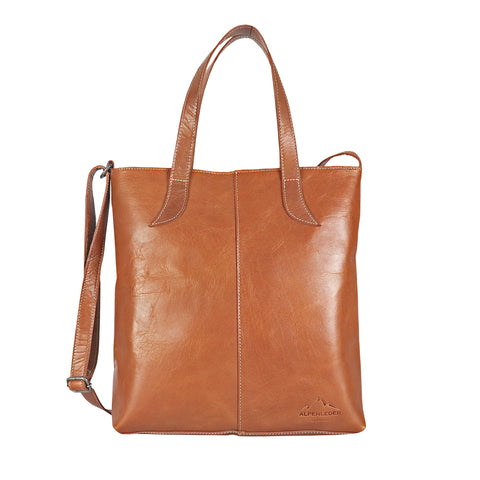 Braune Handtasche IMPERIA aus pflanzlich gegerbtem Vollleder mit verstellbarem Schultergurt und Tragegriffen, präsentiert auf weißem Hintergrund.
